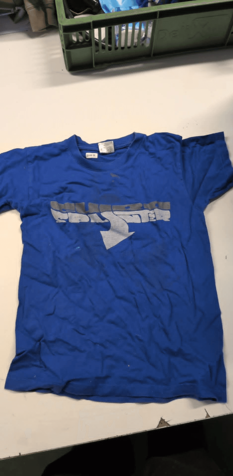 a blue t-shirt with the word oster on it